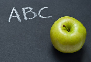 Blackboard with apple