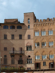 Siena - Gothic facades of palaces at Piazza del  Campo