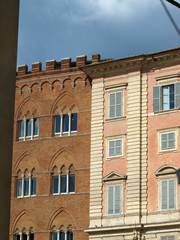 Fototapeta na wymiar Siena - Gothic facades of palaces at Piazza del Campo