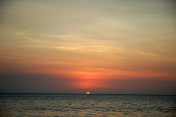 a beautiful sunset view from the beach