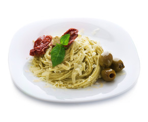 Italian Pasta with Pesto sauce,olives,basil and dried tomato