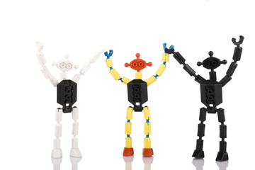 three toy bricks peoples