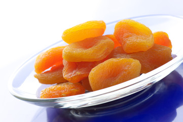 Fototapeta na wymiar Dried apricots on plate
