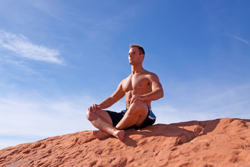 Man meditating outdoors