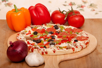 Fresh italian pizza and vegetables