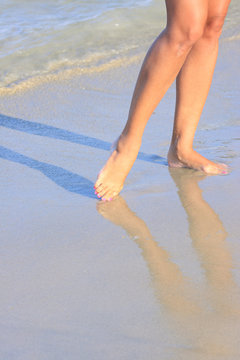 legs on a beach