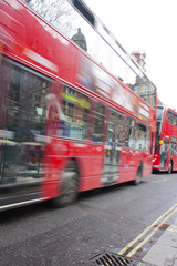 red london buses moving