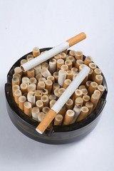 group concept creative cigarette in ashtray