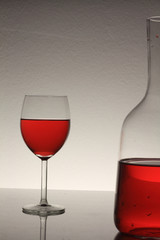 red wine in glass and bottle