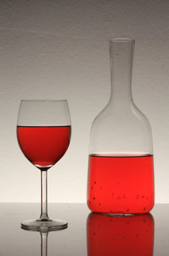 red wine in glass and bottle