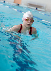 Girl swimming breaststroke