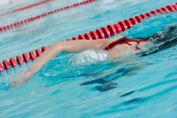 Girl swimming stroke face down