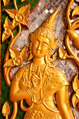 Angel in native Thai style wood carving