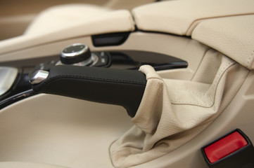 detail of a hand break in a car