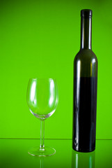 Wine glass on green background