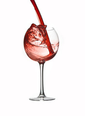 pouring red wine isolated