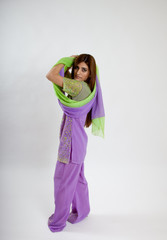 Indian woman dancing with a vail