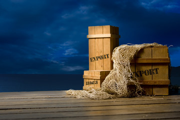 wooden crates packed for export on dock