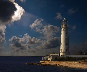 Gordijnen lighthouse at night. © Alexander Ozerov
