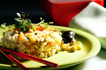 Risotto with carrots, peas and different herbs