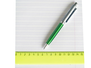 School writing-book, ruler and pen