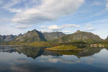 Naklejka na ściany i meble Tranquil scene and reflections in Norwegian Fjord