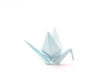 Origami bird. Child paper articles.