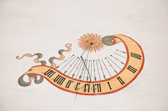 Sundial on the wall of a castle. Fuessen Germany