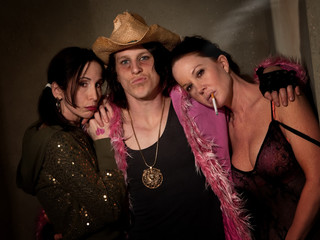 Prostitute in hallway with pimp