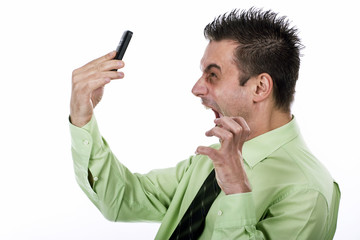 angry businessman screaming on the phone