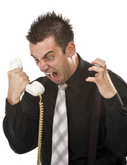 angry businessman screaming on the phone