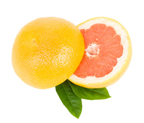cut red grapefruit with leaves