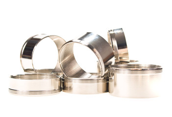 steel chromium-plated rings with thread on a white background