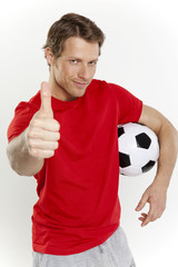 daumen hoch zum fußball