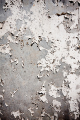 Grungy textured background with peeling wall