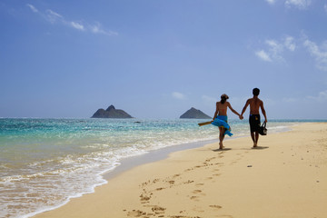 young couple at the beach in hawaii