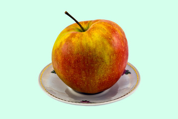 Apple on a dish