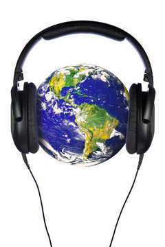 Headphones on the world. Globe from NASA images