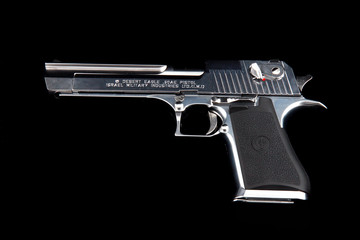 A gun Desert Eagle on a black background