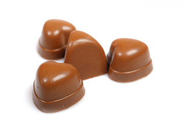 Delicious background of swiss dark chocolates, milk chocolates,