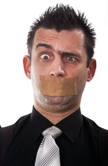 Funny businessman with tape on his mouth