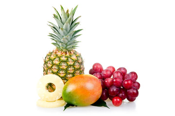 Fototapeta na wymiar Pineapple, mango and grapes isolated