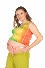 Pregnant woman belly wrapped in pink bow