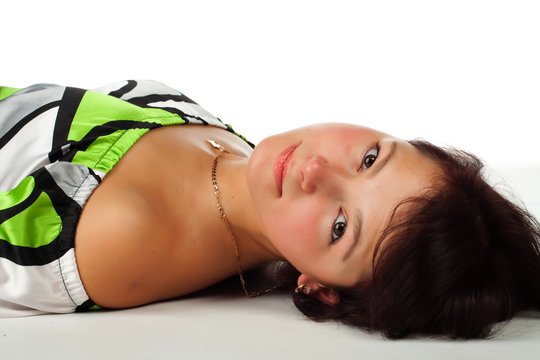 beautiful young woman lying on the floor