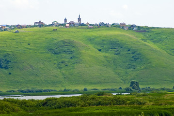 Fototapeta na wymiar village on a hill
