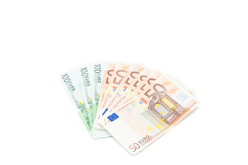 Euro banknotes isolated on a white background..