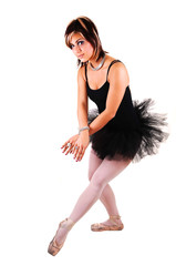 Naklejka premium A young beautiful ballerina dancing.