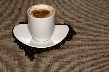 Coffee with heart on hessian