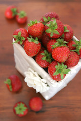 Box with fresh organic strawberries