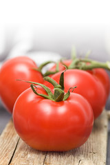 Tomatoes on wood plate